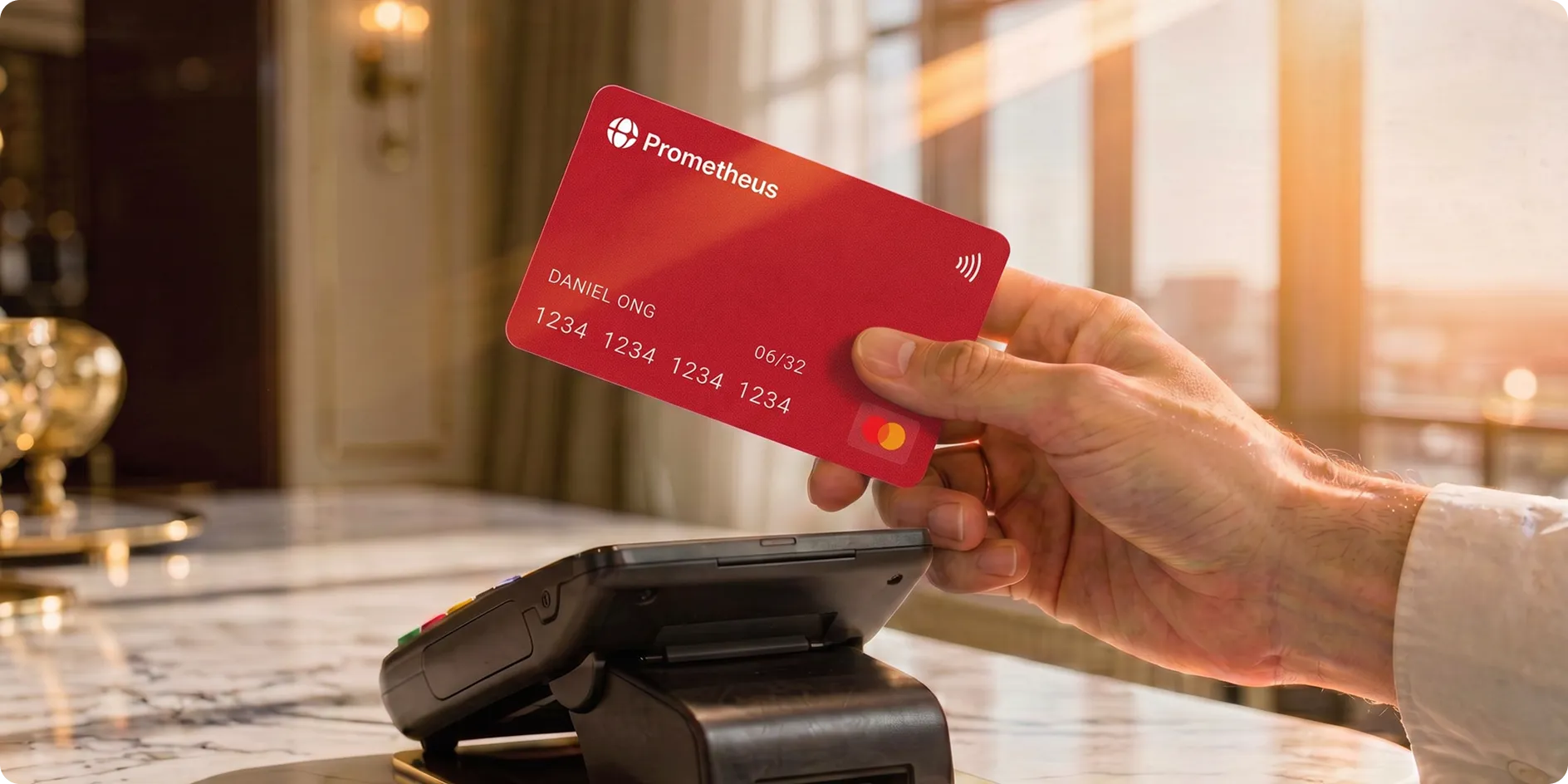 The generated output from the production prompt: a hand mid-tap with the card on a warm-lit marble surface, in the trained brand register